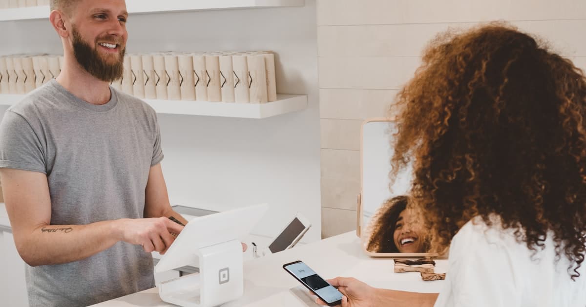 Person using a credit card for online banking in Germany