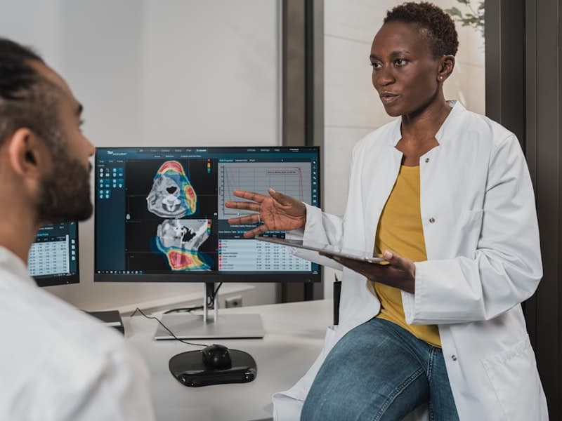 Expat consulting with a doctor about private health insurance in Germany